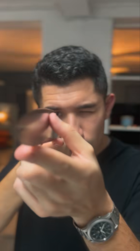 Zak Bermudez inspecting a freshly sharpened blade edge